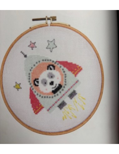 De kleine astronaut, moderne kruissteekboek nr. 154 in 7 talen.